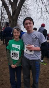 Runners posing with drink